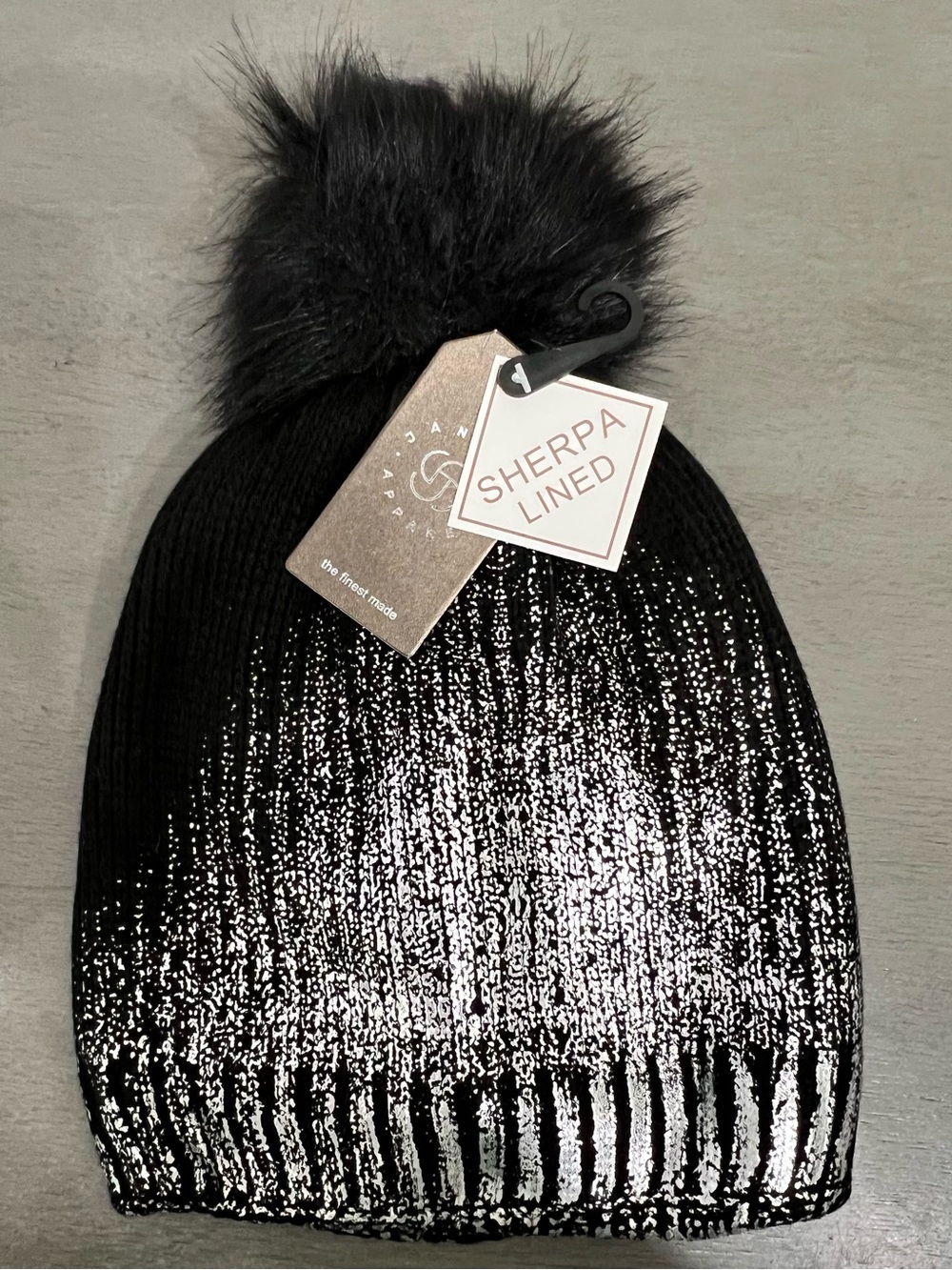 NWT silver and black sherpa lined Pom Pom beanie